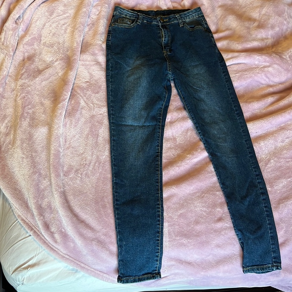 Dark colored skinny jeans